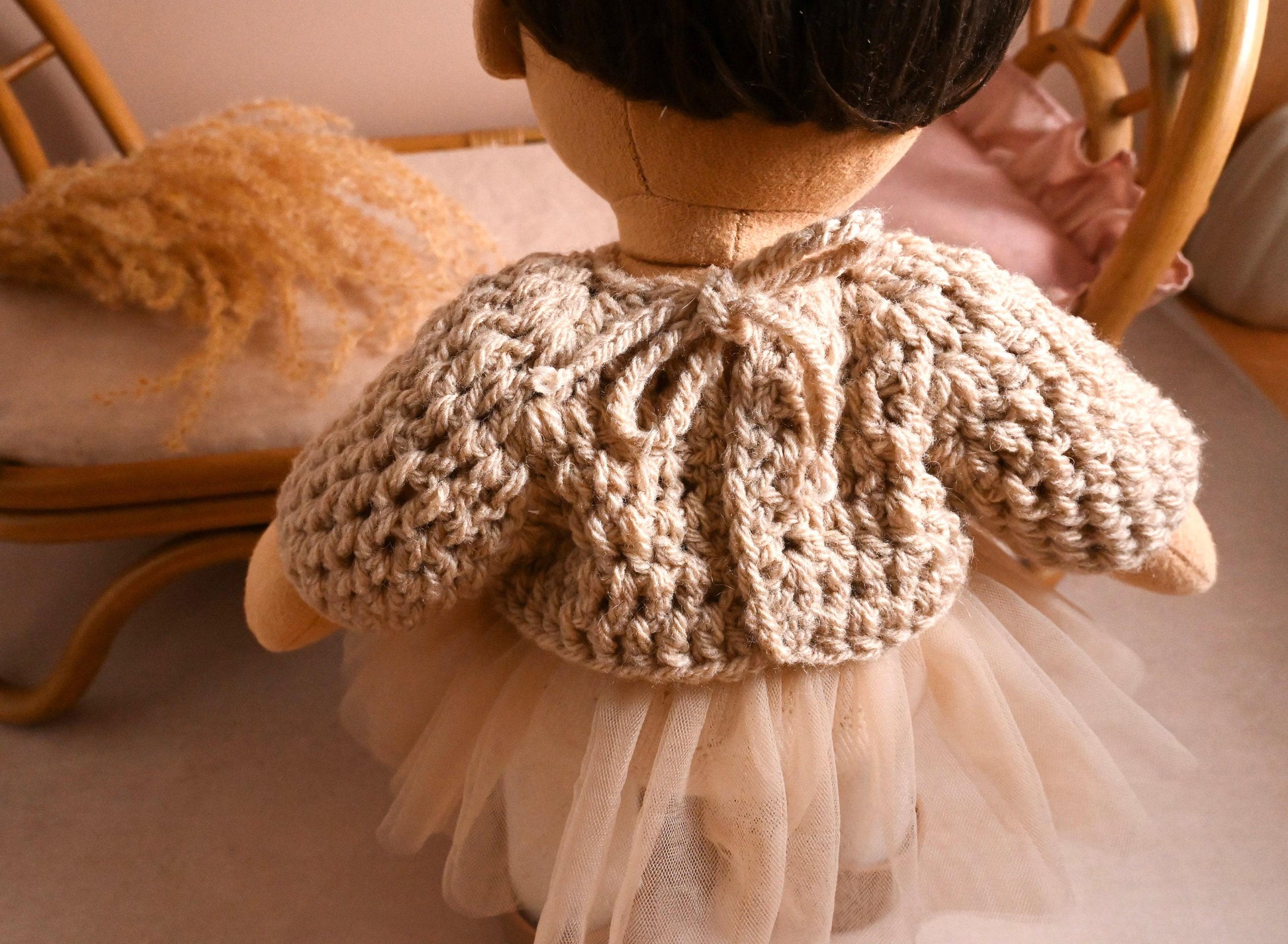 A dreamy little outfit with the perfect blend of comfort and charm.

This set features a hand-crocheted chunky knit sweater in a soft natural tone — warm and textured, yet light enough for year-round play. Paired with a floaty cream tulle skirt layered over delicate tights, it brings a gentle, ballerina-inspired elegance to your doll's wardrobe.

Perfect for storytelling, dressing up, or quiet moments of pretend-play.