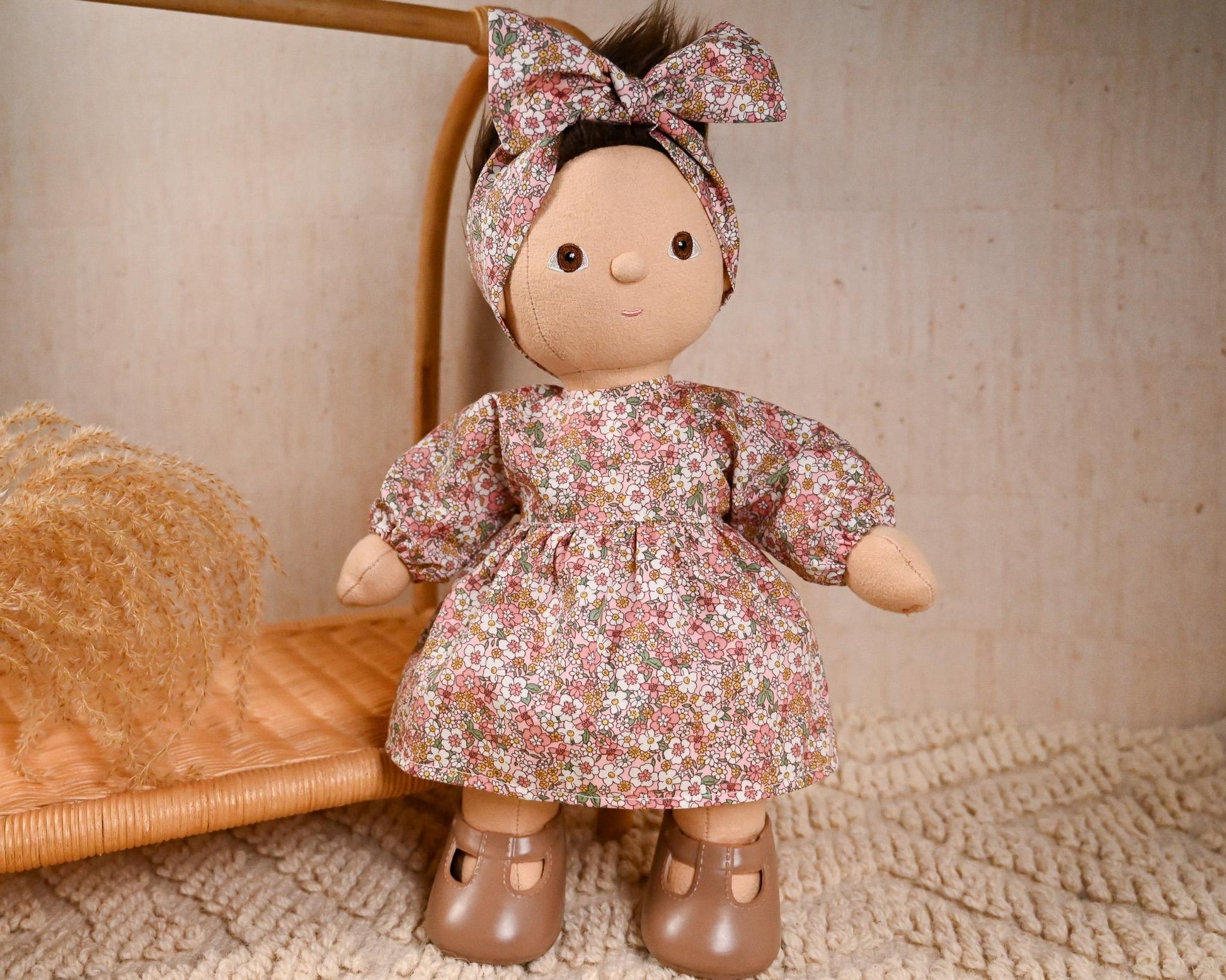 This sweet floral set is full of charm and perfect for everyday adventures. The puff-sleeve dress features a soft pink and wildflower print, made from lightweight cotton — breathable, soft, and just the right amount of vintage.

It’s paired with a matching oversized bow headband to complete the look, making it ideal for tea parties, garden strolls, or simply looking adorable on the shelf.